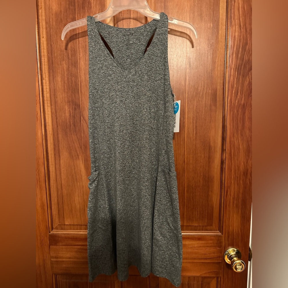 Work-out dress. 
Brand New
Size Medium 
With pockets